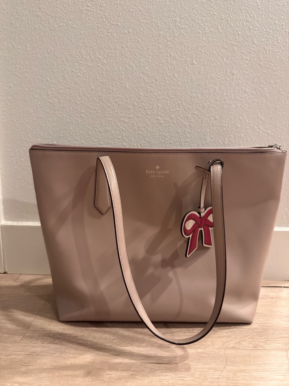 kate spade taupe leather tote with bow charm